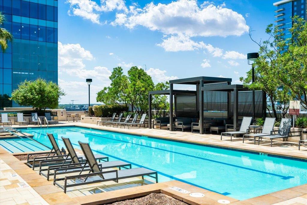 Resort-style pool deck with cabanas at the 360 Tower